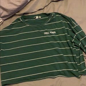long sleeve, green “chill vibes” shirt